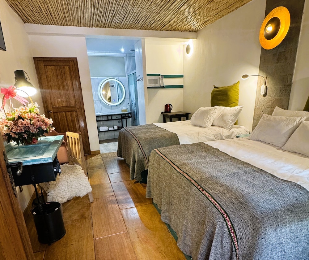 Family Room, Multiple Beds, Kitchenette, Courtyard View photo 1