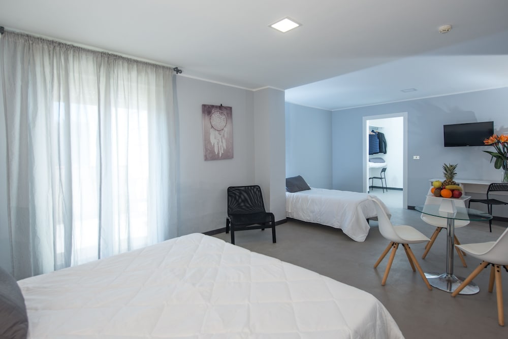 Quadruple Room (2 adults + 2 children)