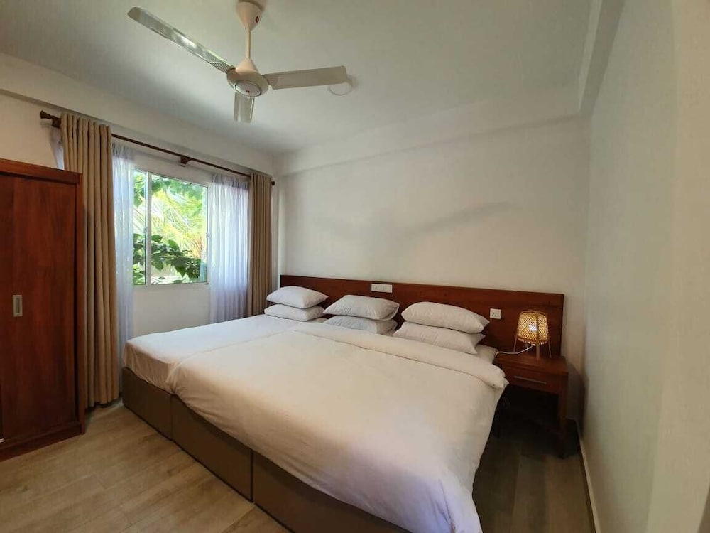 Deluxe Triple Room, 1 Bedroom, Non Smoking, Garden View