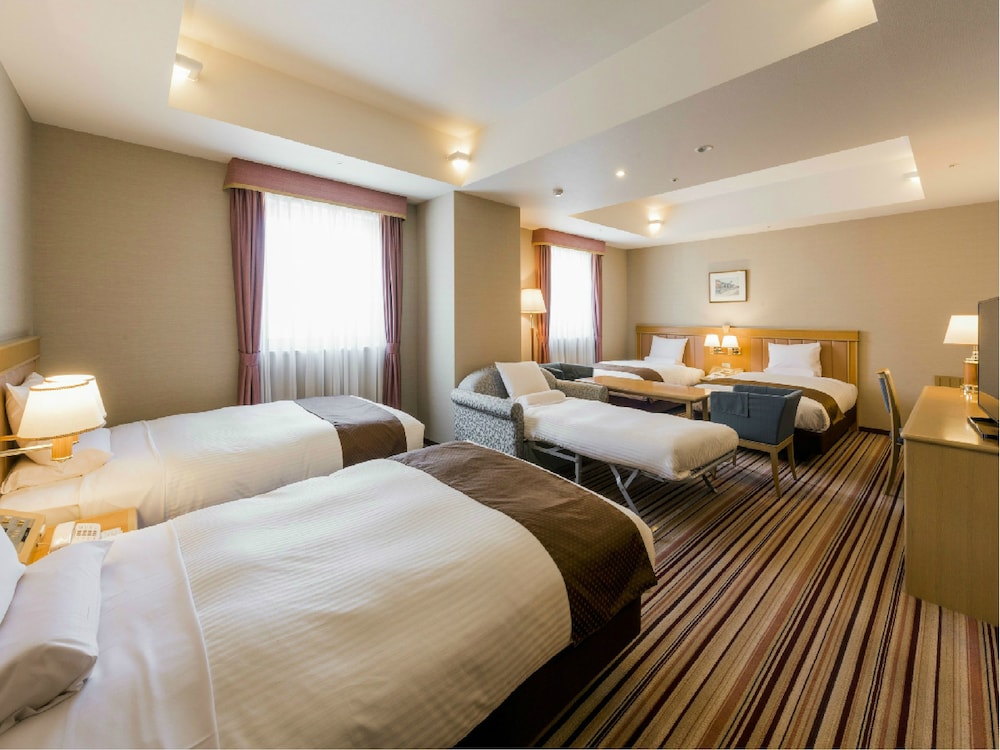 Quadruple Room, Non Smoking (Eco Plan - No Cleaning Service) photo 3