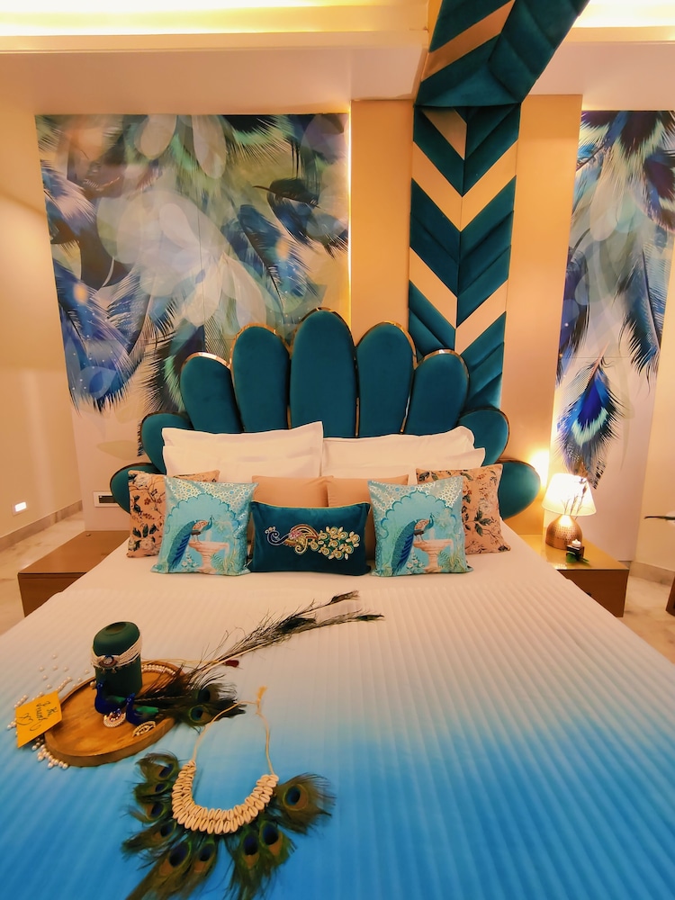 Peacock Theme designer Room with 240 degree City view and Beautiful peacock Bed & Sitout