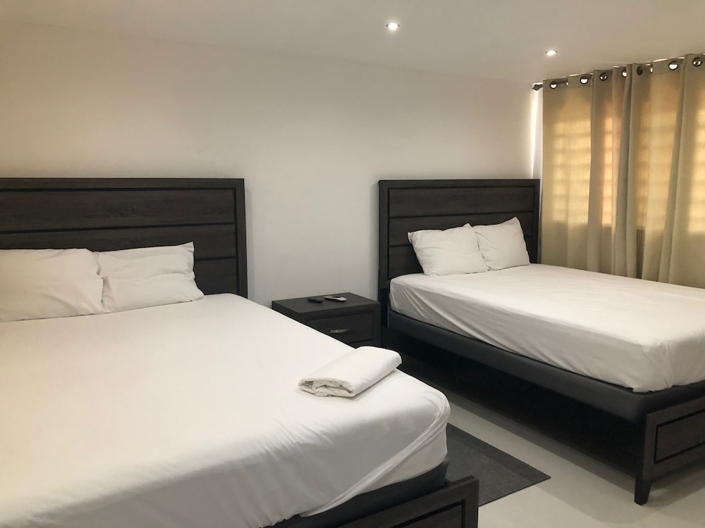 Basic Quadruple Room, 2 Queen Beds, Beachside photo 2