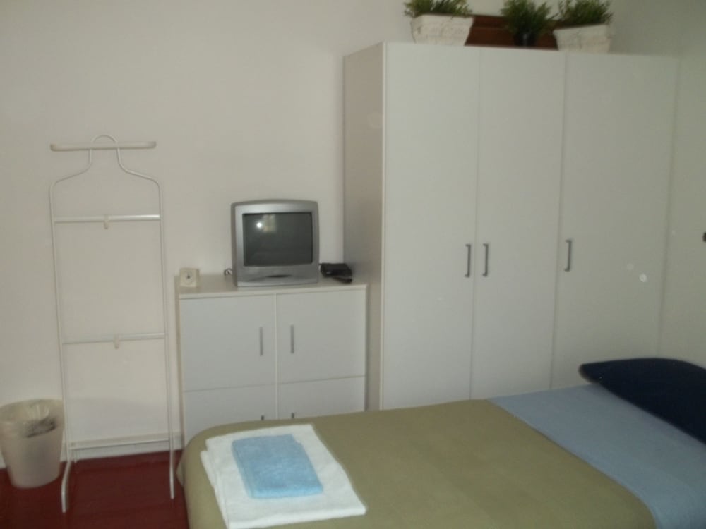 Family Triple Room (Camera Residence)