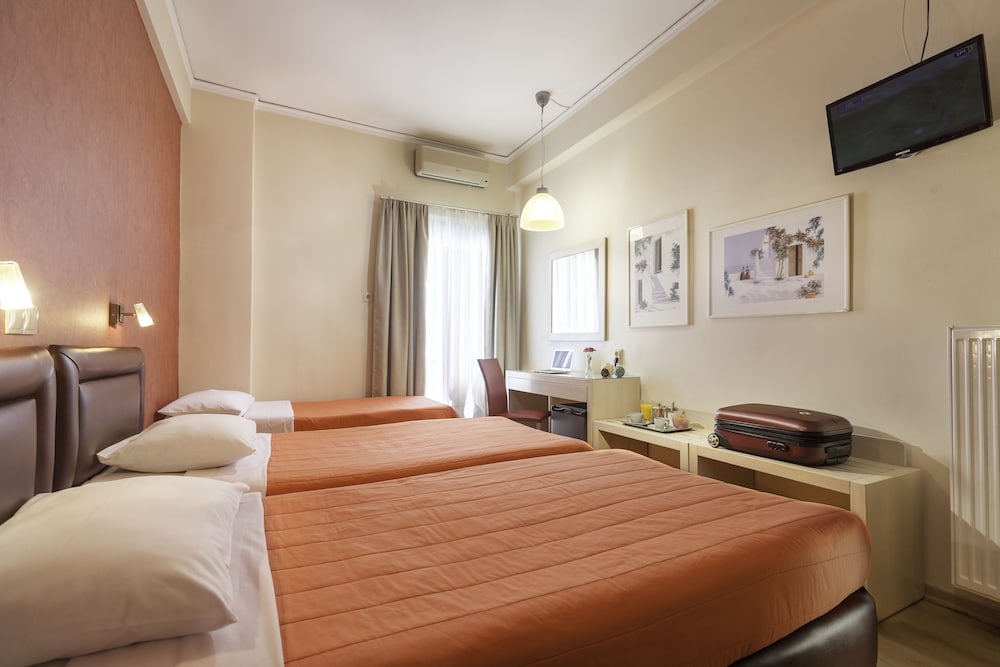 Triple Room - Photo 1