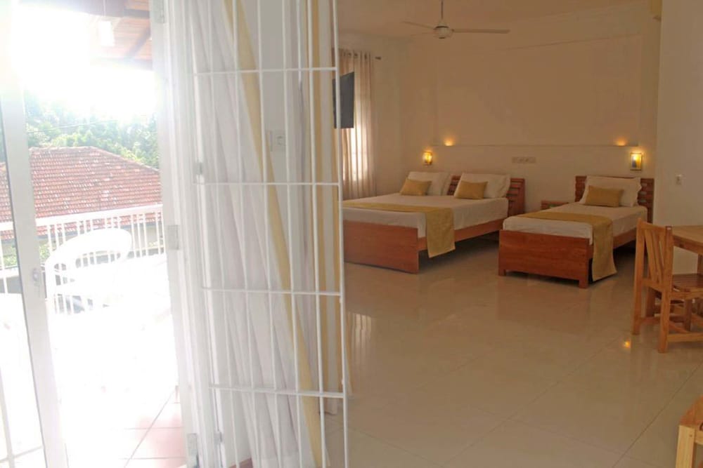 Standard Quadruple Room, City View photo 2