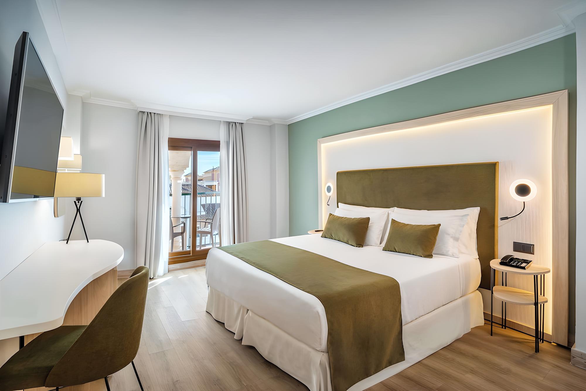 Relax in style with our modern hotel room.