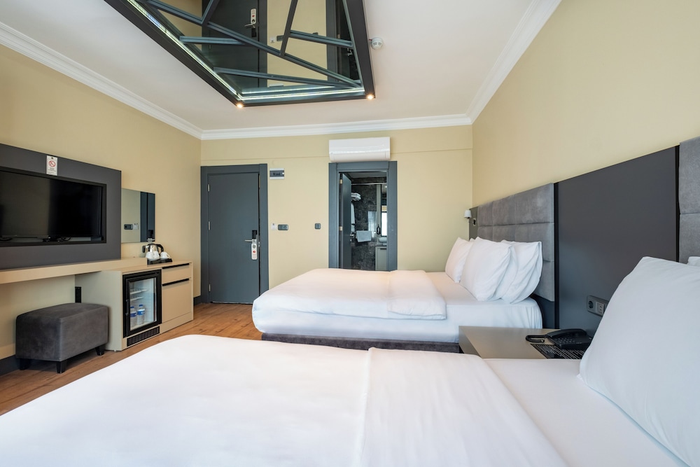 Family Triple Room - Photo 2