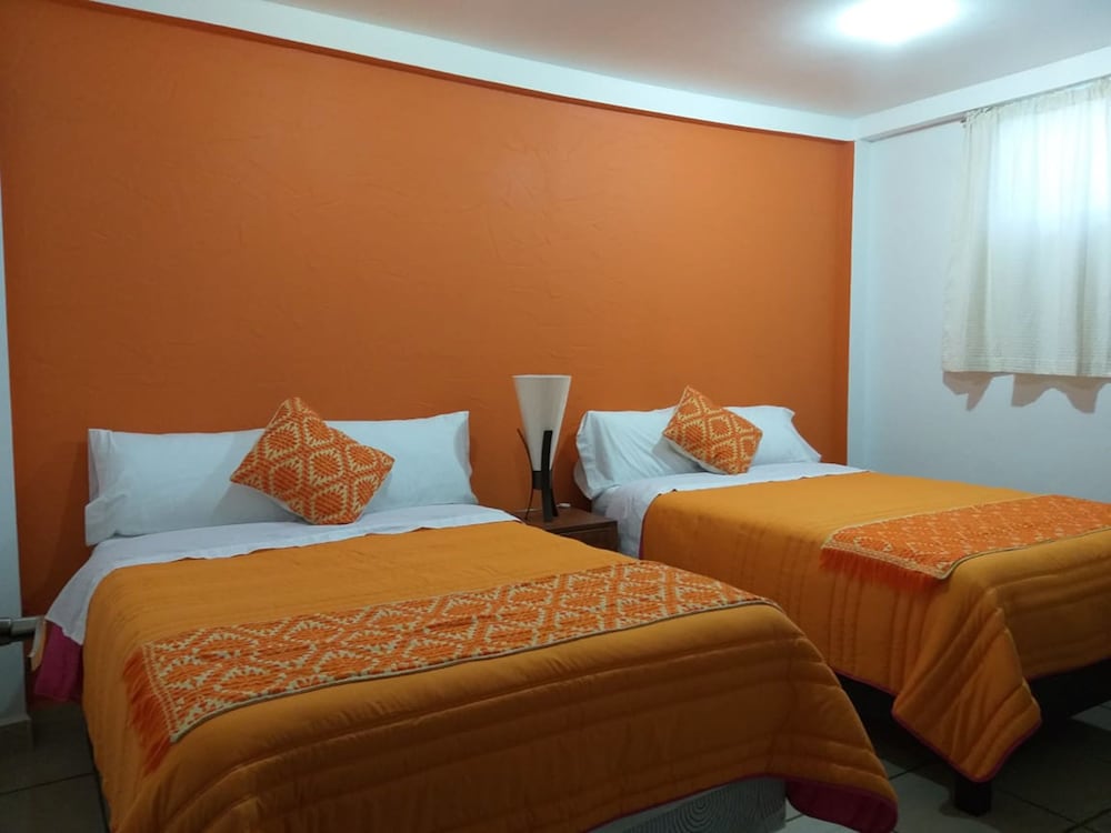 Classic Quadruple Room, 2 Double Beds (Naranja) photo 1
