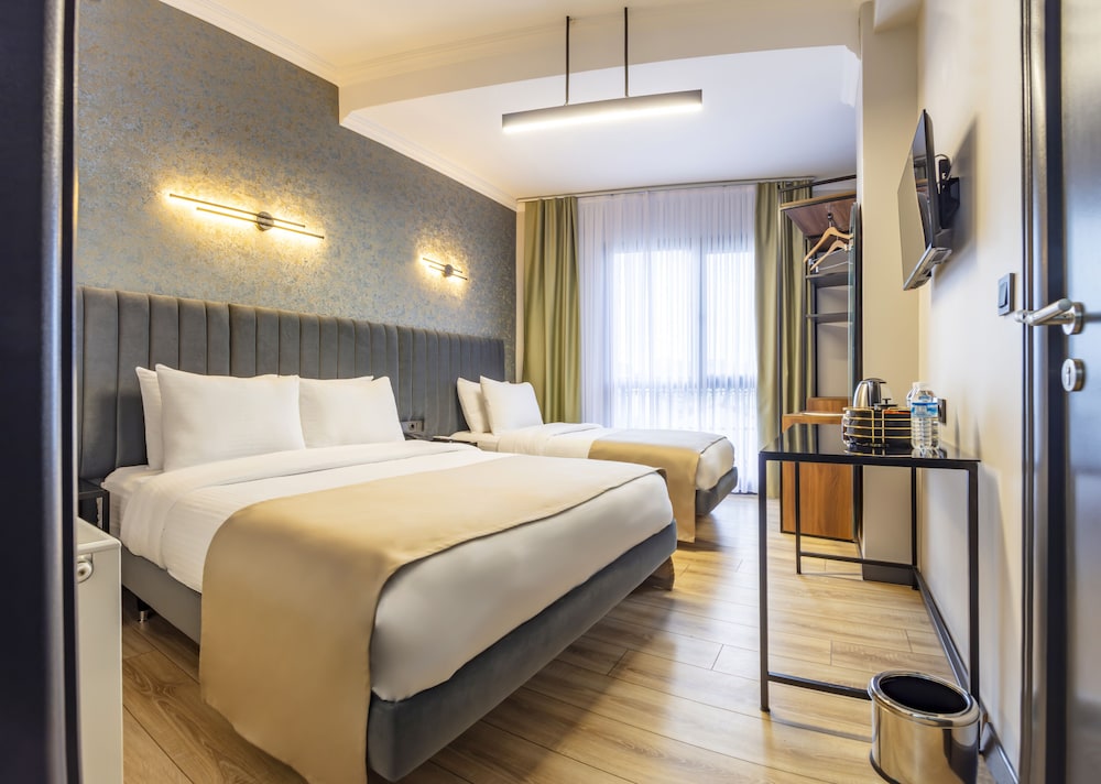 Deluxe Triple Room - Photo 3