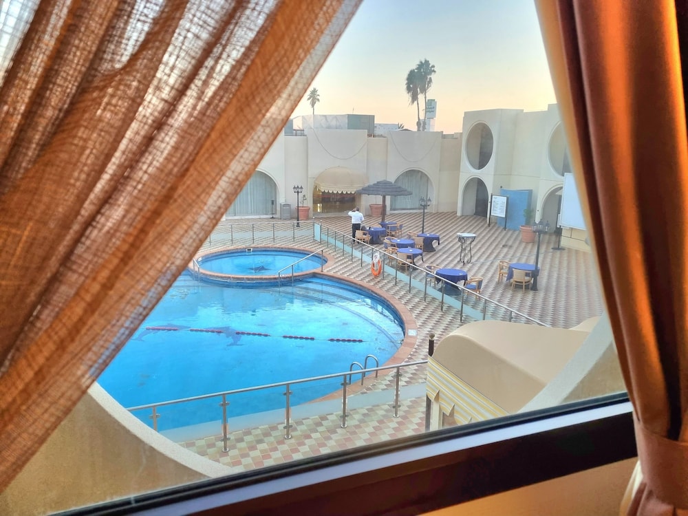 Standard Room, 1 King Bed, Pool View - Photo 3