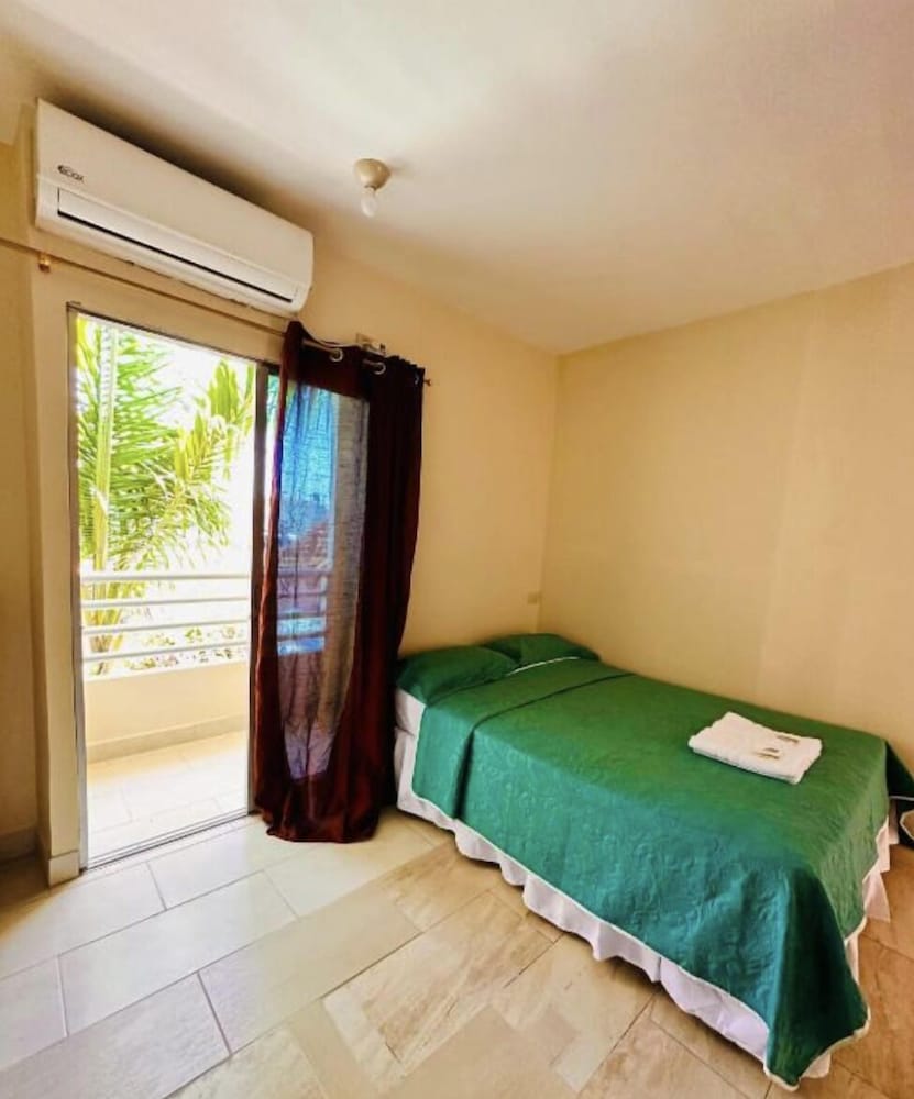 Exclusive Quadruple Room, 2 Double Beds, Balcony, Ocean View photo 2