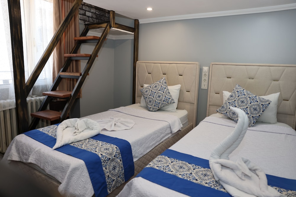 Deluxe Triple Room - Photo 4