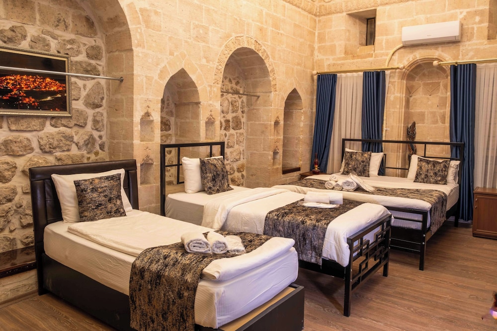 Traditional Quadruple Room, Multiple Beds, Non Smoking, Courtyard Area photo 1
