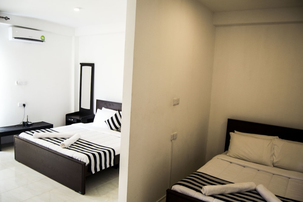Deluxe Quadruple Room, Non Smoking, Garden View photo 1