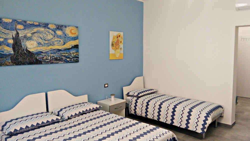 Comfort Quadruple Room, Garden View