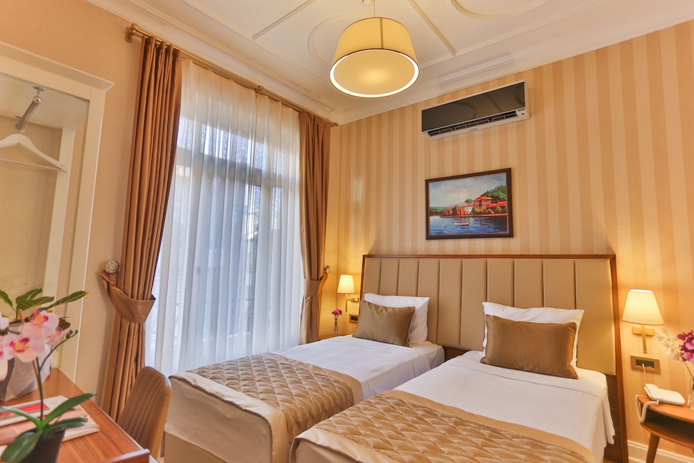 Family Triple Room, Multiple Beds, Non Smoking, Private Bathroom photo 1