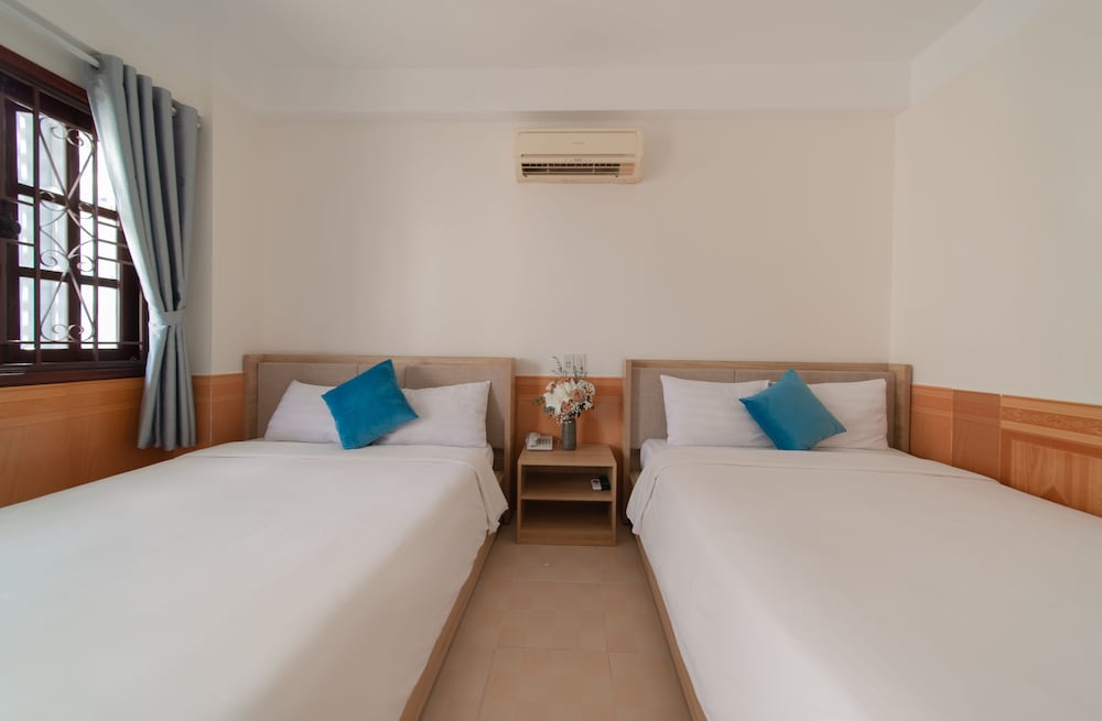 Deluxe Quadruple Room - Photo 5