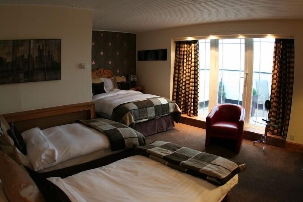 Deluxe Quadruple Room - Photo 3