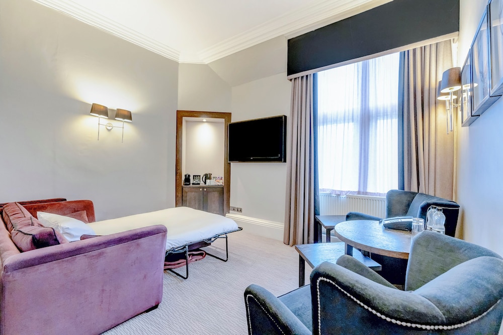Deluxe Triple Suite - Photo 2