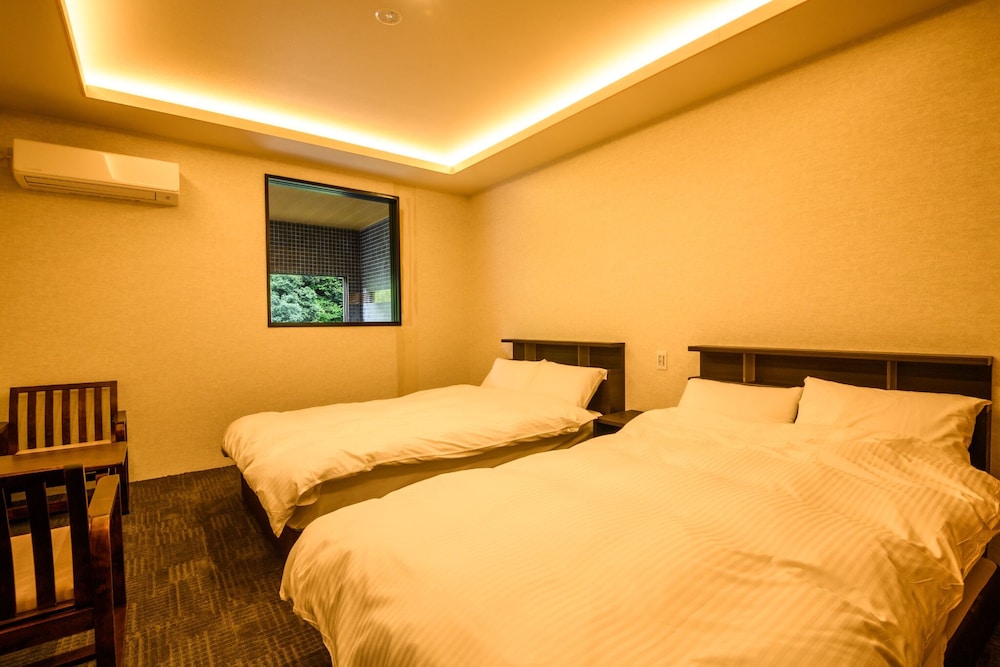 Twin Room with Open-Air Hot Spring, Sauna & Stream View - New in 2025 photo 2