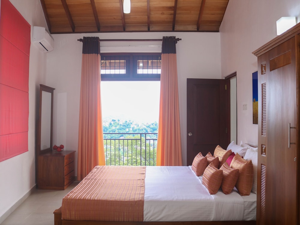 Deluxe Room - Photo 1