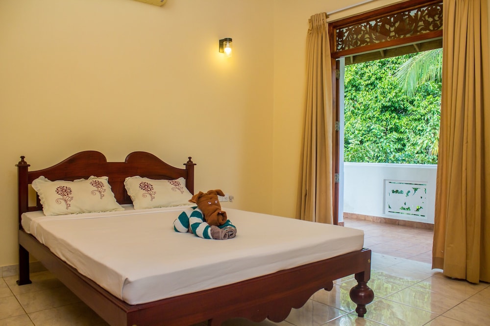 Deluxe Double Room, Balcony, Garden View