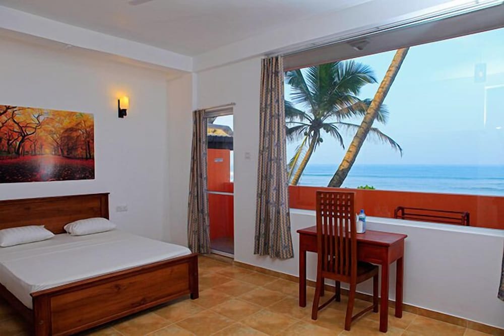 Deluxe Room, Beachside photo 1