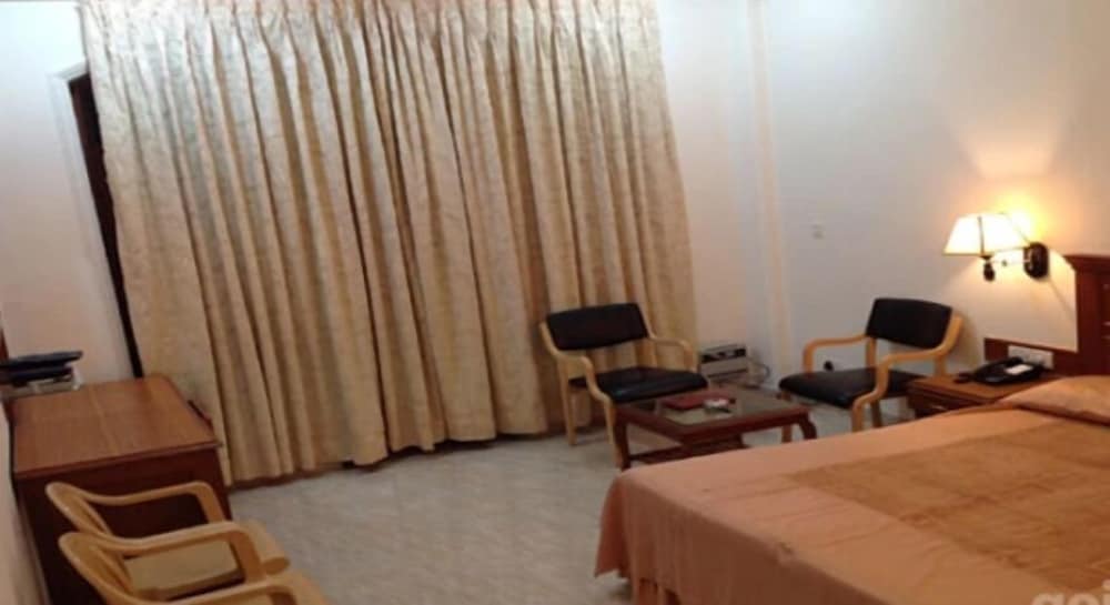 Deluxe Room - Photo 10