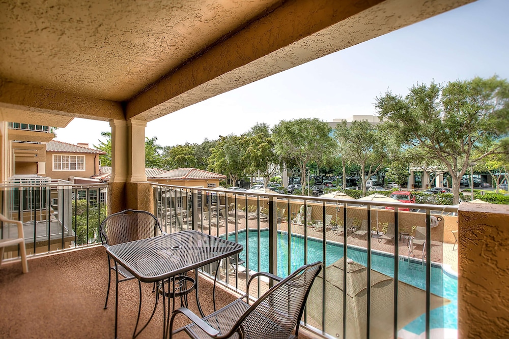 Room, 2 Double Beds, Accessible, Pool View (Hearing) - Photo 1