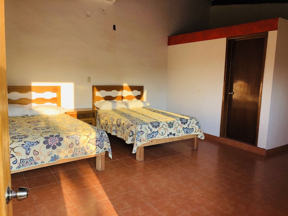 Basic Quadruple Room, 2 Double Beds, Pool View