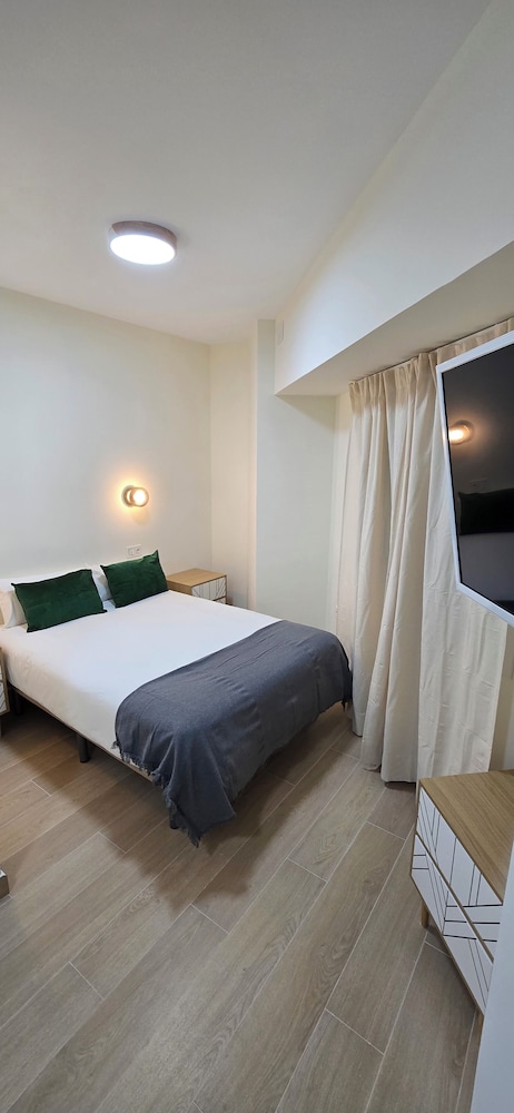Habitación Triple, Vista a la Ciudad