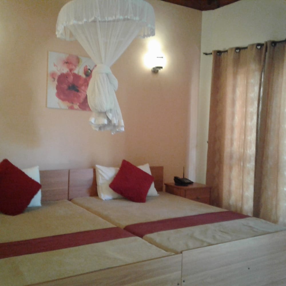 Deluxe Cottage, 2 Twin Beds, Garden View, Garden Area photo 3