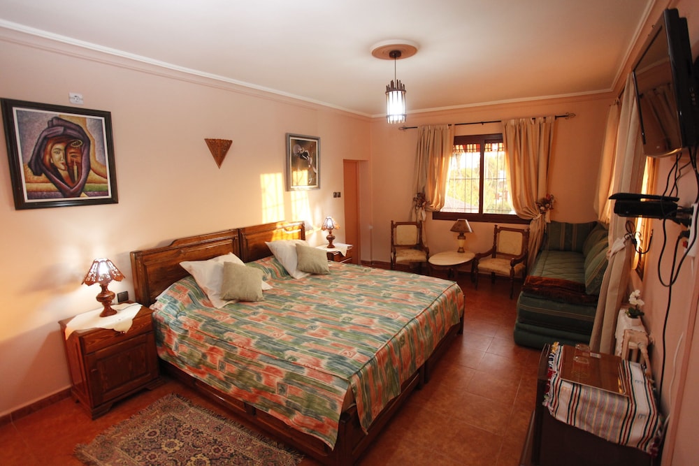 Basic Triple Room, Multiple Beds, Garden View photo 1