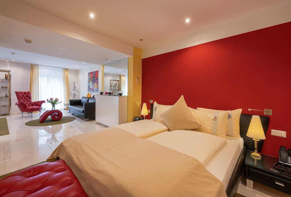 Exclusive Suite, 1 King Bed with Sofa bed, Kitchenette - Photo 1