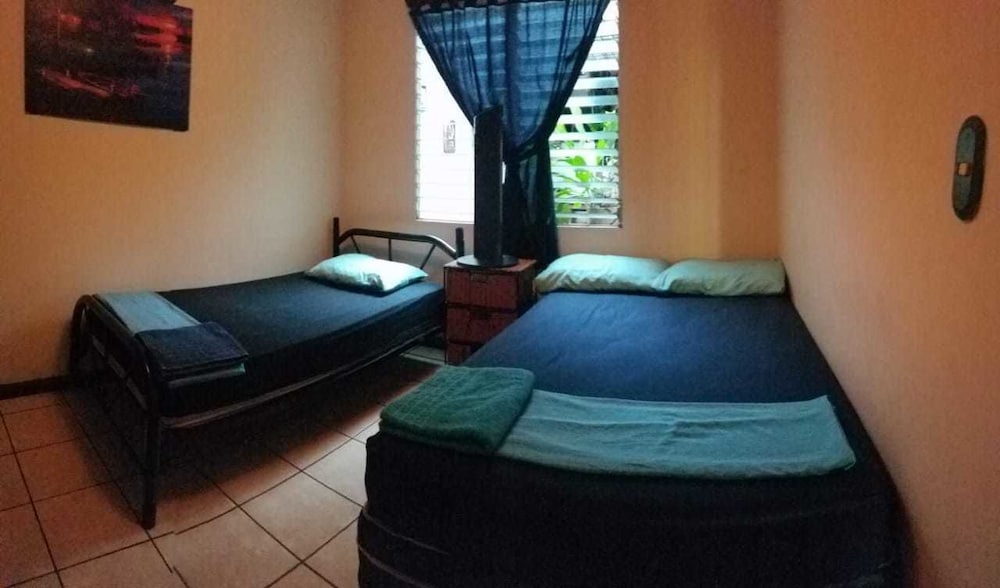 Standard Room, Multiple Beds, Private Bathroom photo 2