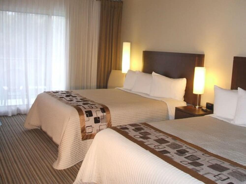 Classic Room, 2 Queen Beds, Single Whirlpool Tub, Balcony