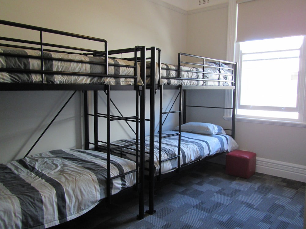 Bed in 4 Bed Mixed Dormitory Room with Private Bathroom photo 1