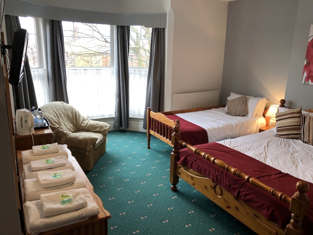 Family Quadruple Room, Multiple Beds, Non Smoking photo 2