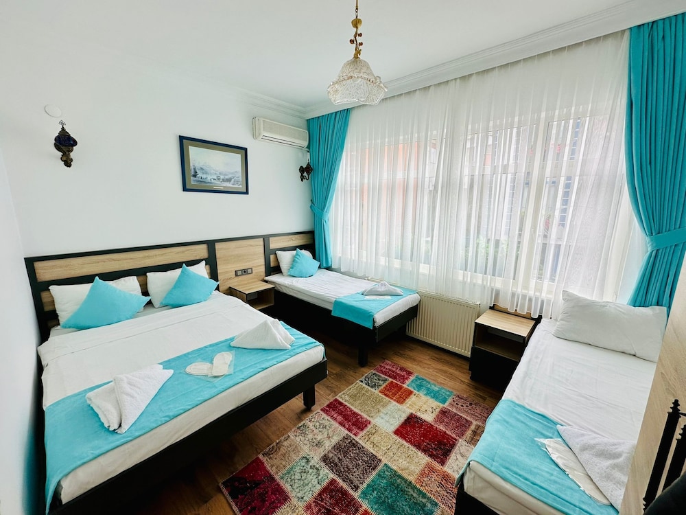 Classic Quadruple Room, 1 Bedroom, Non Smoking, City View photo 1