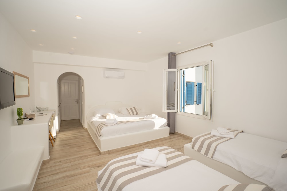 Deluxe Quadruple Room, 1 Bedroom, Patio, Garden View - Photo 1