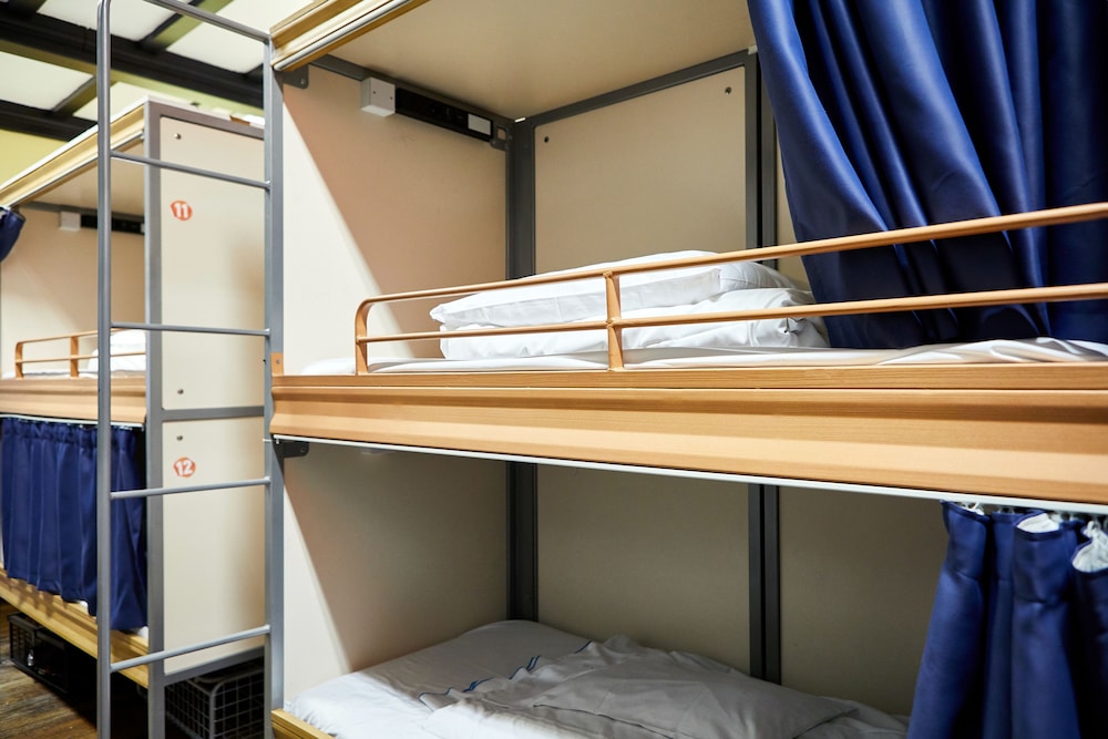 Bed in 18 Pod Dorm with Shared Bathroom photo 1