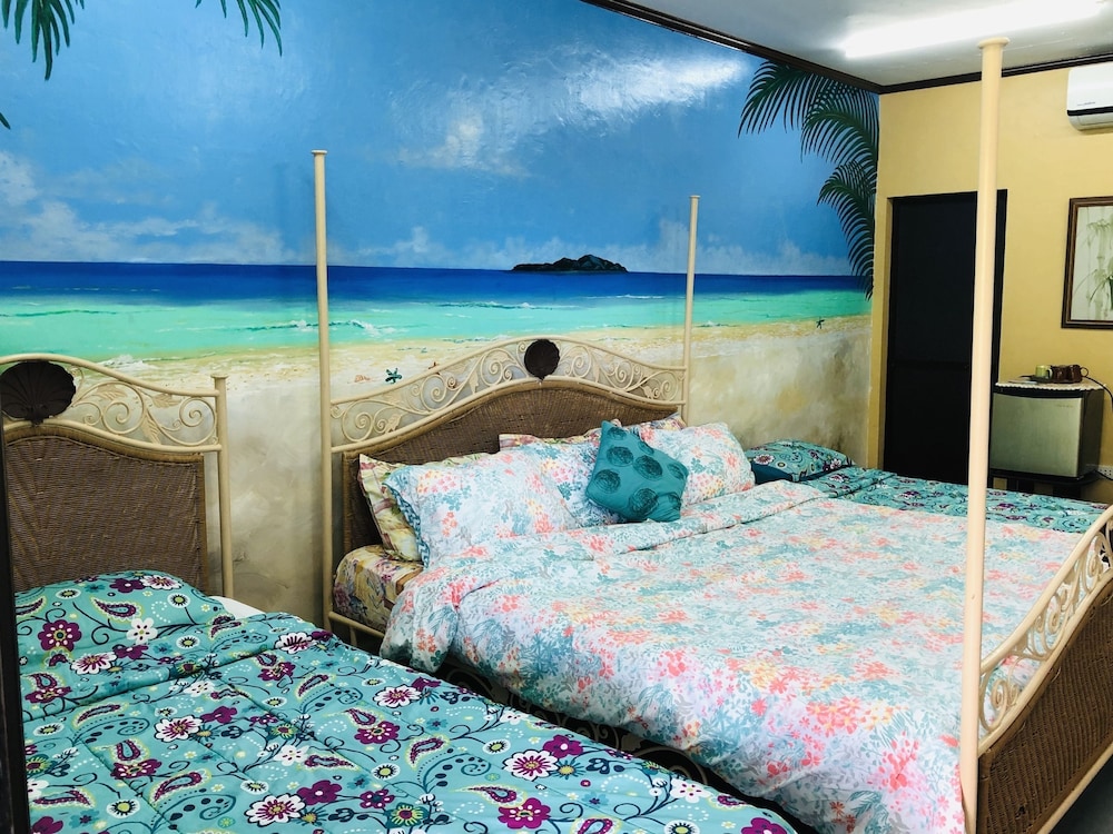 Deluxe Quadruple Room, 2 Double Beds, Non Smoking, Sea View photo 1