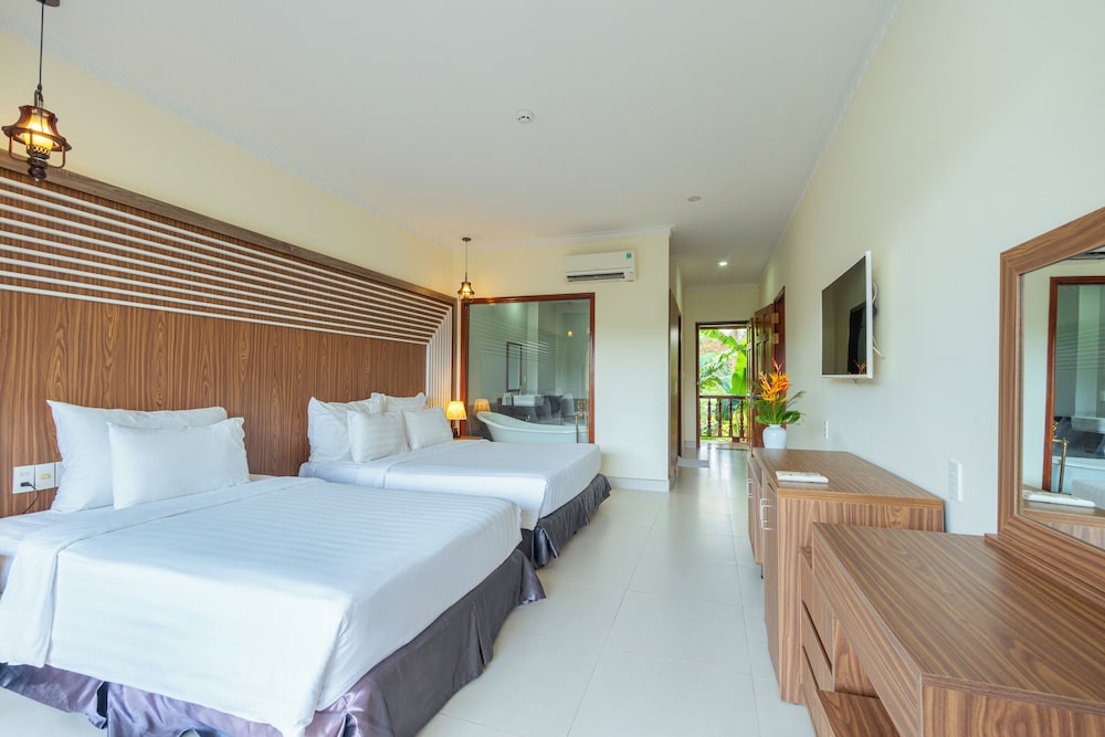 Deluxe Triple Room, Balcony, Garden View
