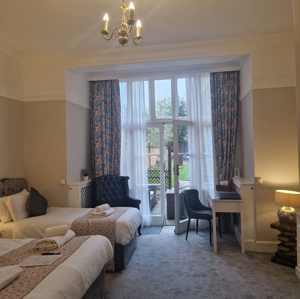 Deluxe Quadruple Room, Garden Area photo 2