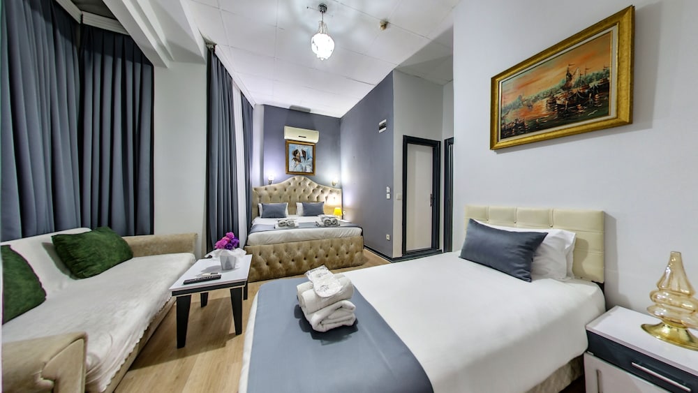 Deluxe Quadruple Room, Non Smoking, Balcony photo 1