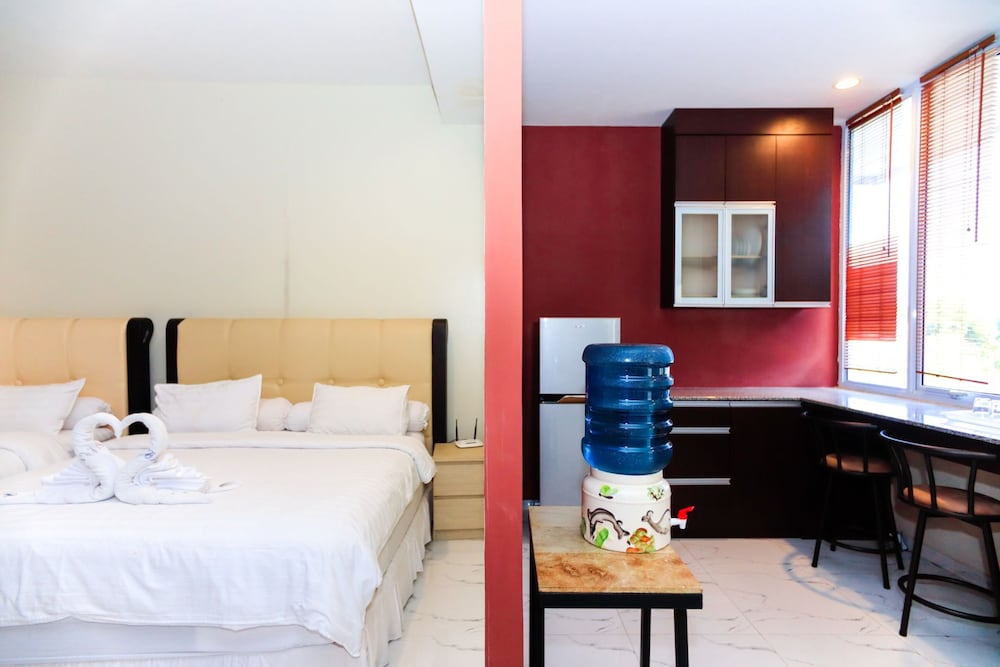 Signature Quadruple Room photo 3