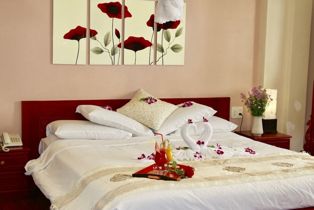 Deluxe Room - Photo 1