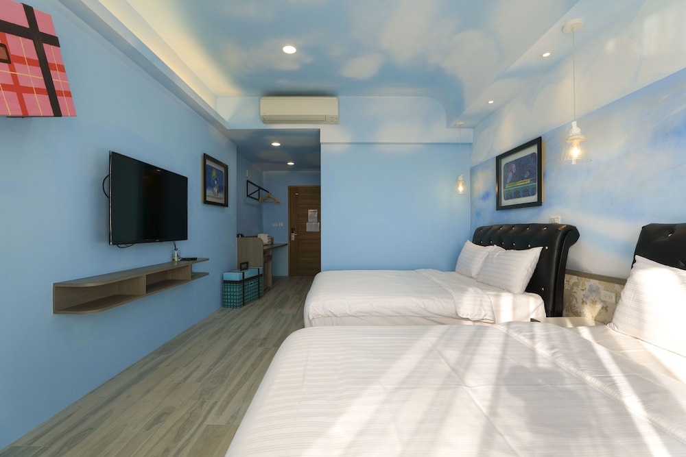 Signature Quadruple Room, 2 Double Beds, Ocean View photo 2