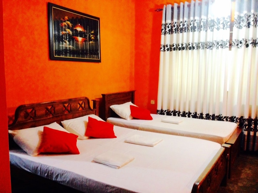 Deluxe Triple Room, Garden View photo 2