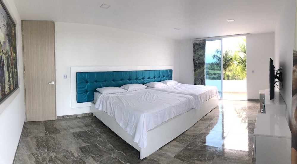 Deluxe Quadruple Room, Garden View
